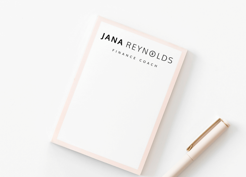 Jana - Financial Coach Logo on Notepad
